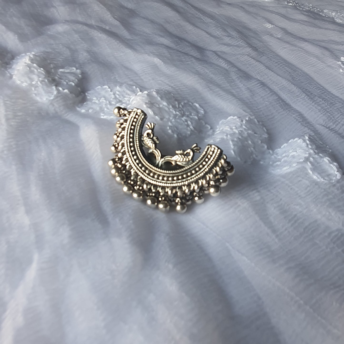 ARDHCHANDRA. The half moon ring.