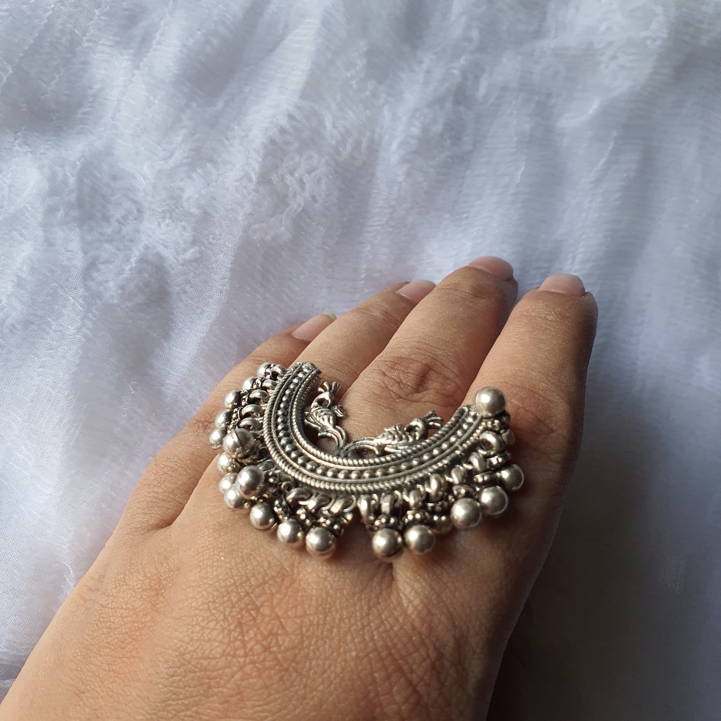 ARDHCHANDRA. The half moon ring.