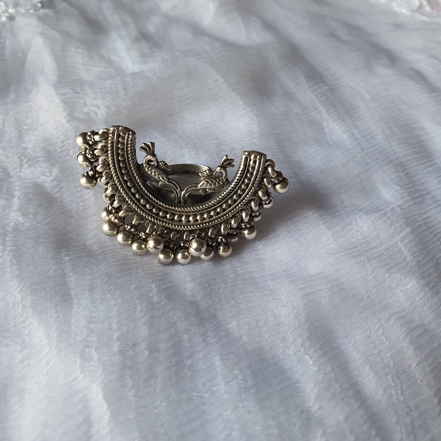 ARDHCHANDRA. The half moon ring.