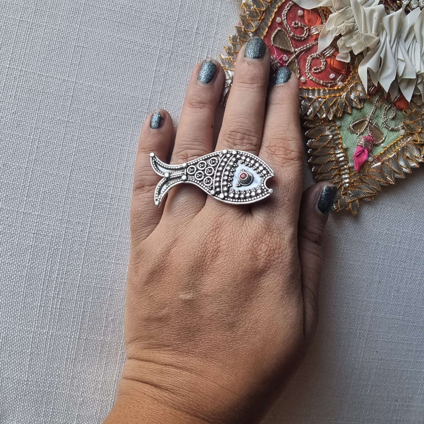 MEENU. Fish rings in rawa work.