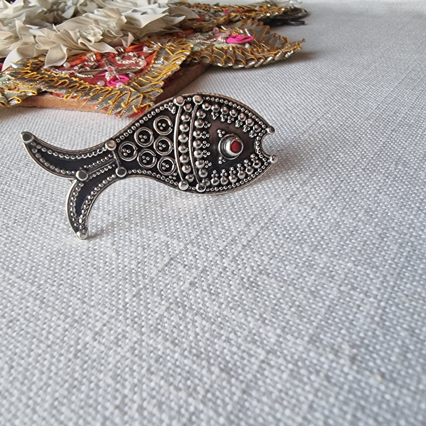 MEENU. Fish rings in rawa work.