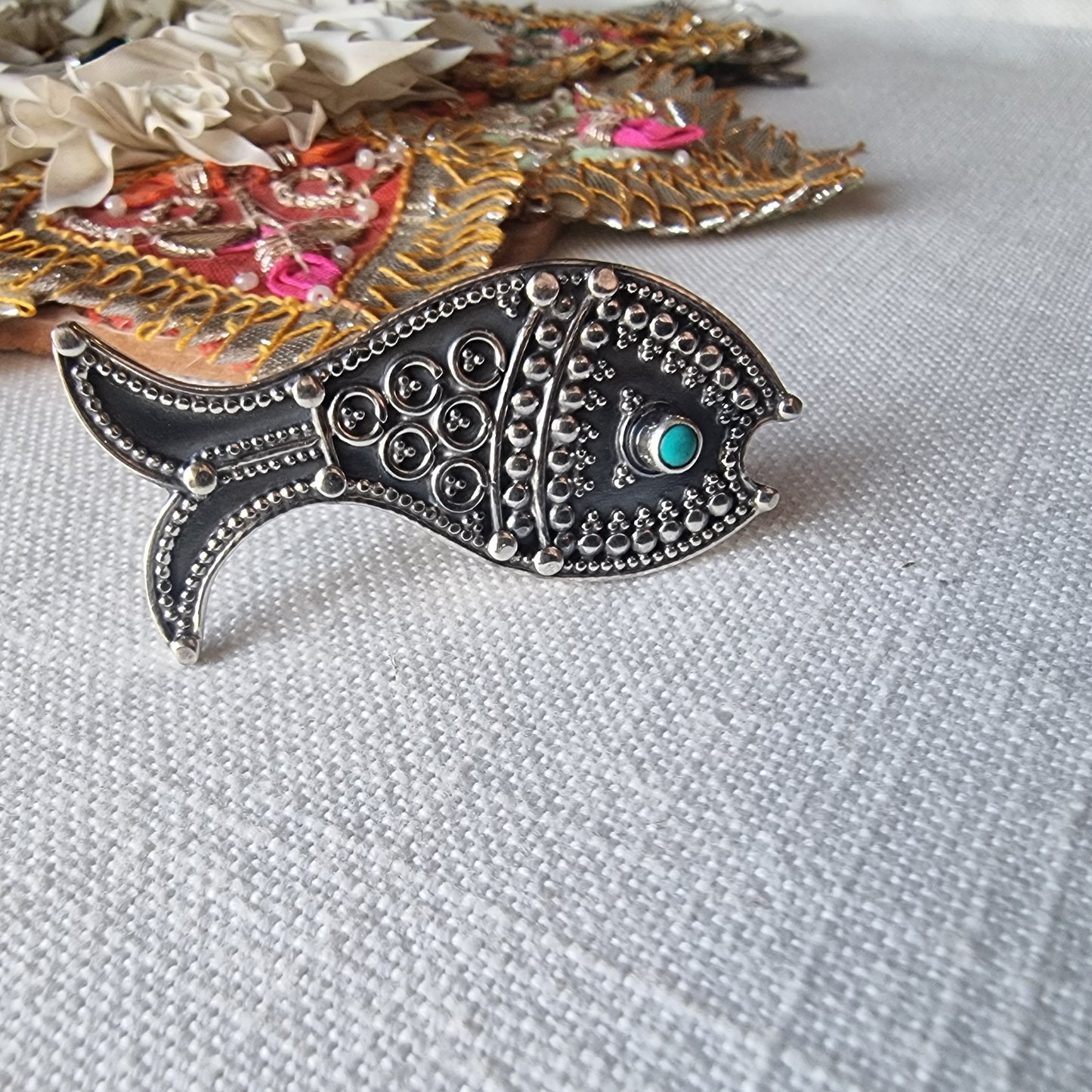 MEENU. Fish rings in rawa work.